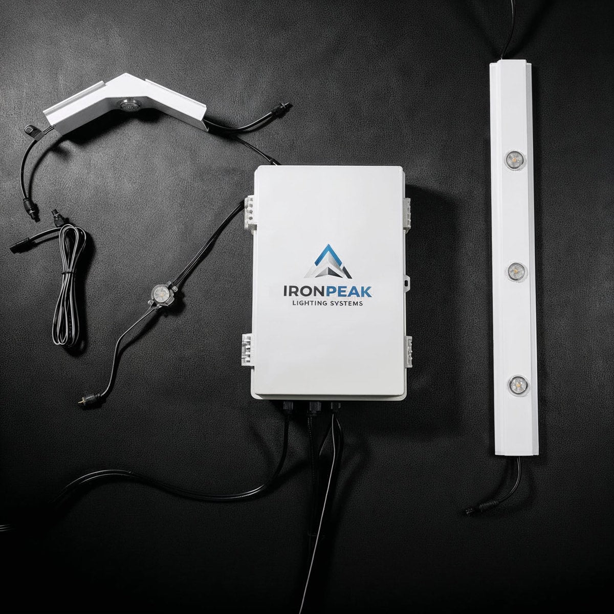 200 ft Roofline Kit — controller, track and two pre-built Apex peaks on a dark studio background